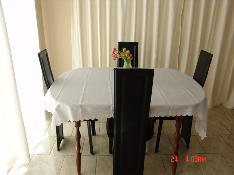 dining table with black chairs.jpg